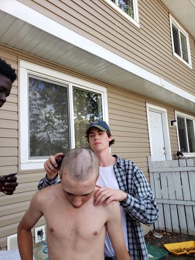 Myself cleaning up his shaved head